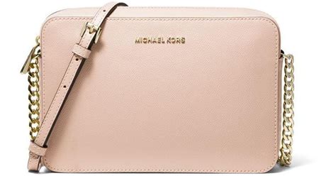 michael kors light pink handbag|Michael Kors crossbody pink bag.